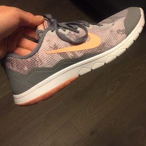 Coral and gray Nike sneakers